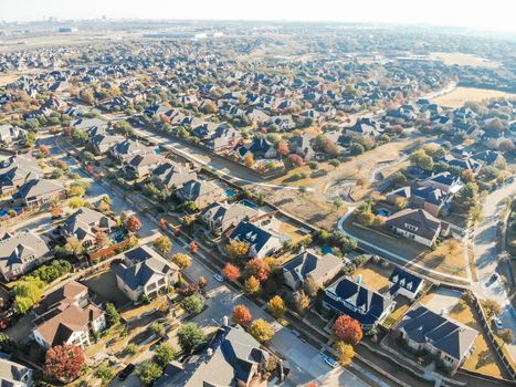 Aerial view new development neighborhood in Cedar Hill, Texas, USA in morning fall with colorful leaves. A city in Dallas and Ellis counties located approximately 16 miles southwest of downtown Dallas