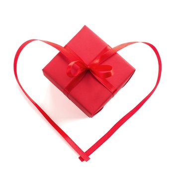 Small red gift box with ribbon bow and ribbon heart studio isolated on white background