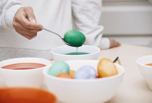 Woman preparing Easter eggs