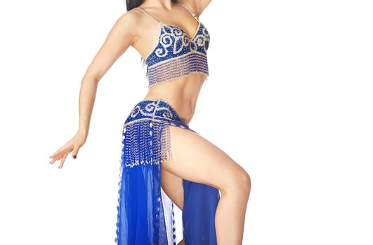 Body of the woman dancing belly dance on a white background