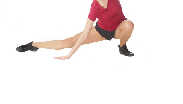 Woman doing fitness stretching execrise on a white background