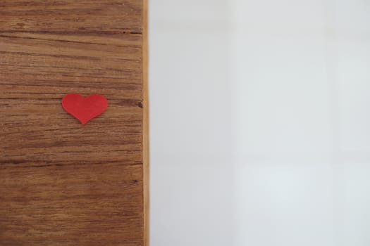 Love Valentines day background with red hearts. copy space on wooden table.