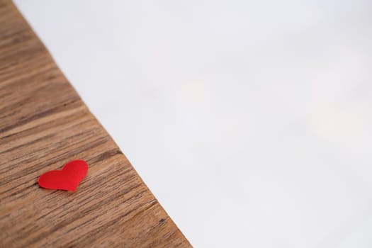 Love Valentines day background with red hearts. copy space on wooden table.