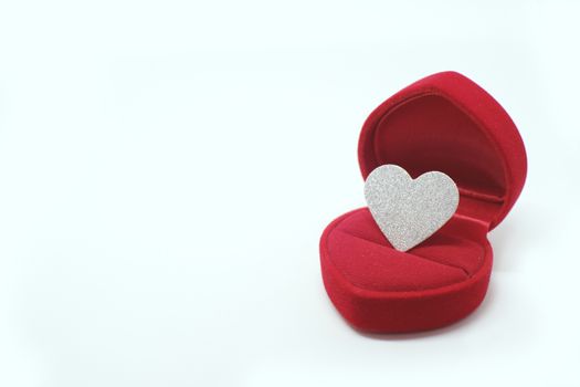  Silver glitter heart in wedding ring box. Valentines day present concept