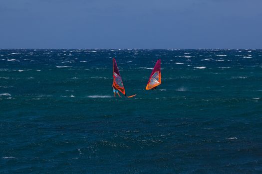 kite surfing on blue waves