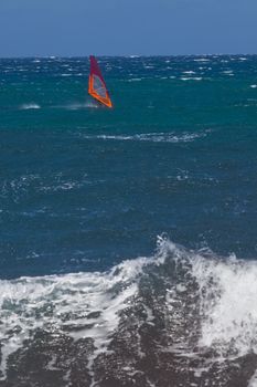 kite surfing on blue waves