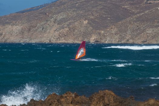 kite surfing on blue waves