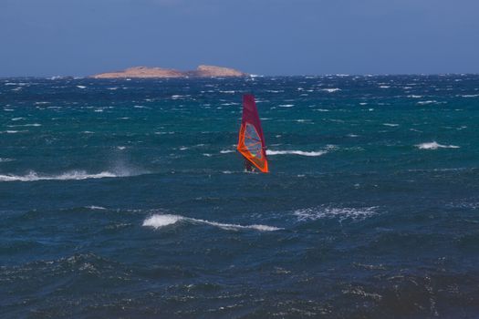 kite surfing on blue waves