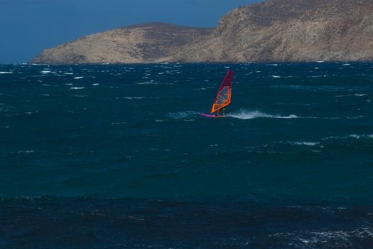 kite surfing on blue waves