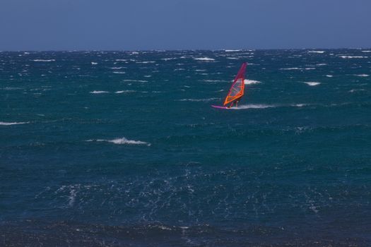 kite surfing on blue waves