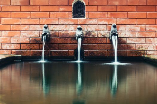 Long exposure of a traditional fountain in Kathmandu, Nepal