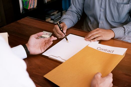 Business people signing contract making a deal with real estate agent Concept for consultant and home insurance concept