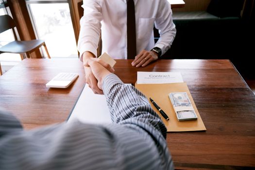 Business people signing contract making a deal with real estate agent Concept for consultant and home insurance concept