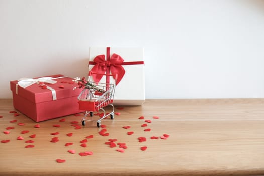 Valentine present. Gift box and red ribbon for romantic couple