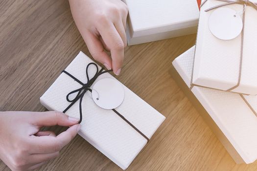 Valentine present. Gift box and red ribbon for romantic couple