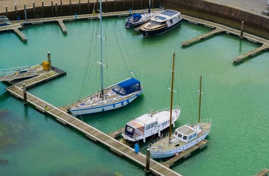 beautiful view on the docks of Vlissingen, typical dutch boats in the harbor, Zeeland, the Netherlands