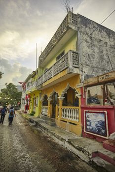 Vertical shot of the architecture of a street of Isla Mujeres in Mexico