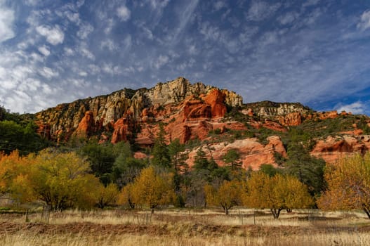Oak Creek Canyon in Arizona with a blue sky with clouds.