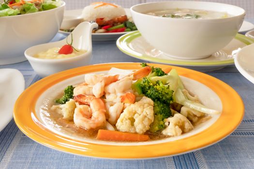 Stir fried shrimp with mix vegetable on dish , asian style food