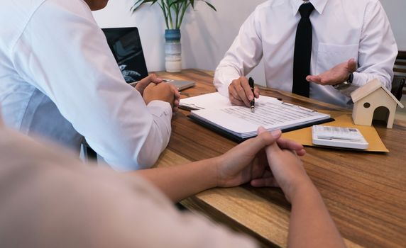 business man signing contract making a deal with real estate agent Concept for consultant