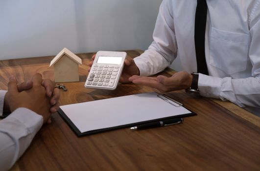 business man signing contract making a deal with real estate agent Concept for consultant