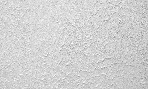 Old White Raw Concrete Wall Texture Background Suitable for Presentation, Paper Texture, and Web Templates with Space for Text.