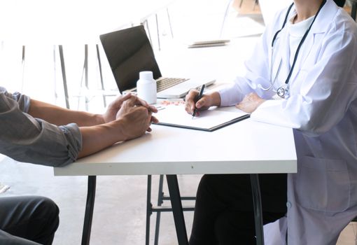 medicine doctor explain diagnosis to doctor team holding and showing clipboard exploring important document