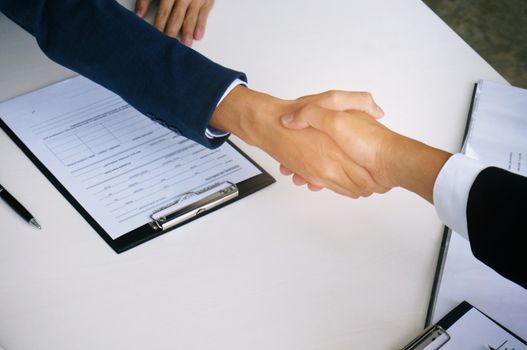 Image business mans handshake. Business partnership meeting concept.