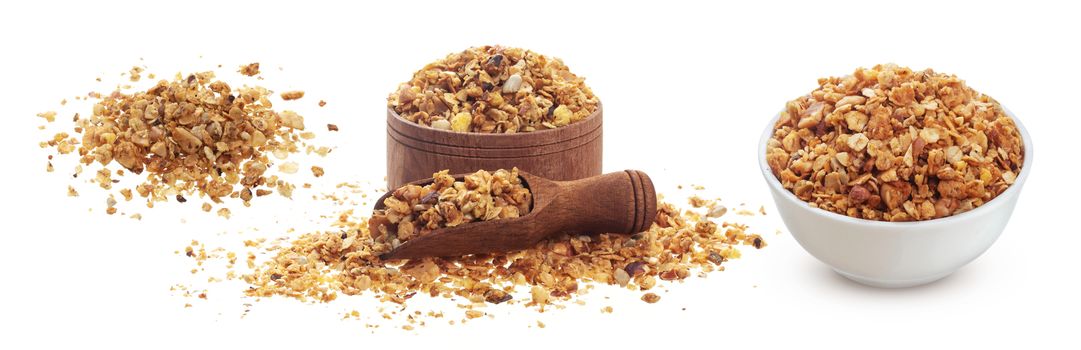 Crunchy granola isolated on white background with clipping path, muesli pile with nuts, collection