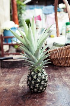 pineapple on wood table closeup