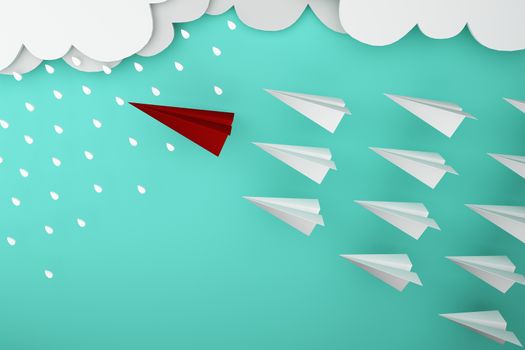 Red paper plane of leading leadership with rain concept