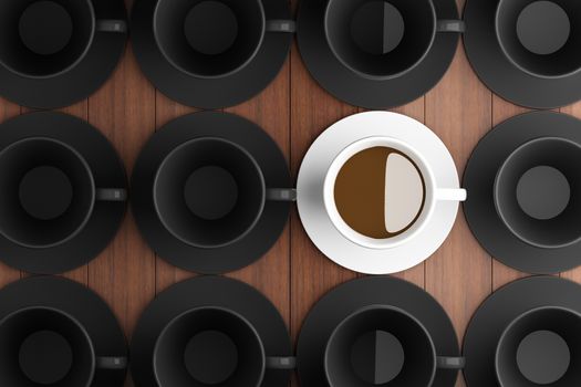 White coffee cup in the middle of a black coffee cup.