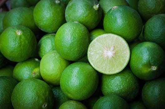 Still life of green lemon cut