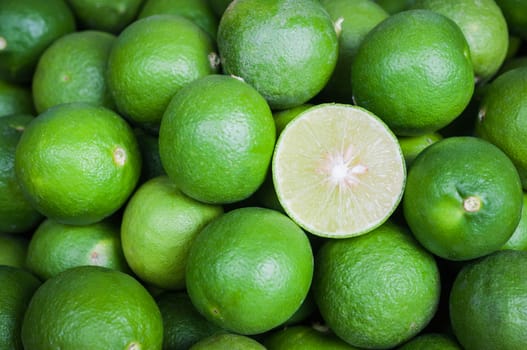 Still life of green lemon cut