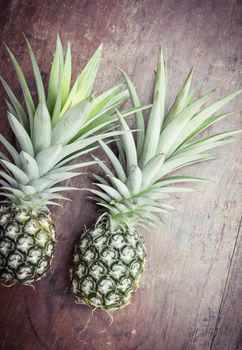 pineapple on wooden background