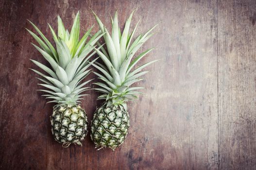 pineapple on wooden background