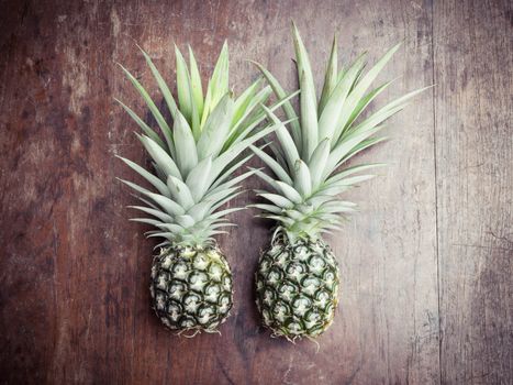 pineapple on wooden background