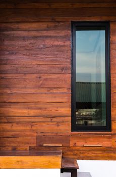 glass window and wood wall