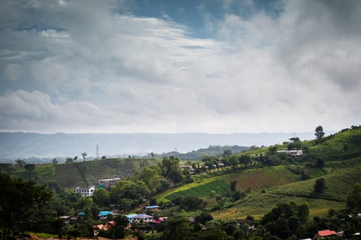 Landscape of cityscape on mountain with clouds sky
