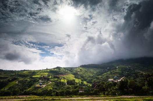 Landscape of cityscape on mountain with clouds sky