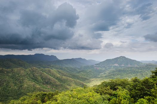Landscape of mountain green forest and clouds sky