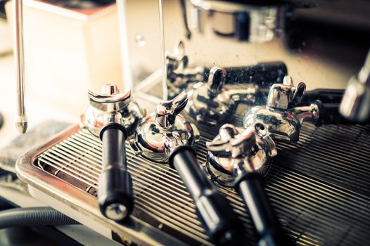 closeup of portafilter with coffee machine