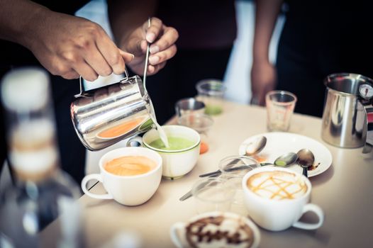 coffee trainer made a hot latte art