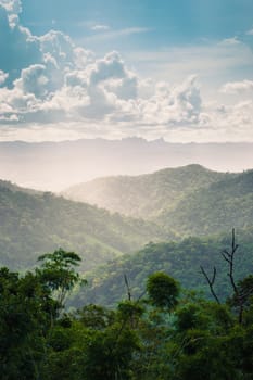 Landscape of mountain green forest and clouds sky