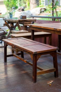 closeup of old wood stool and table