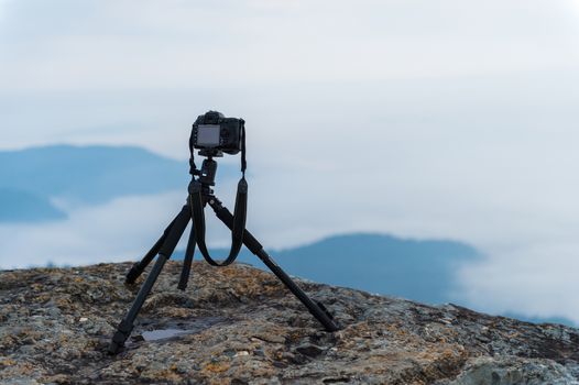 closeup of camera take a photo on mountain