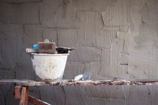concrete wall making and object tool closeup
