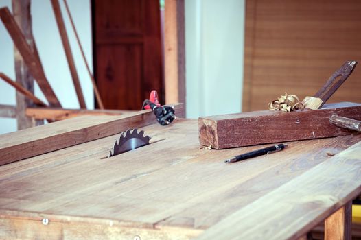 closeup of table and carpenter tool
