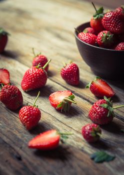 strawberry fruit on grunge wooden background