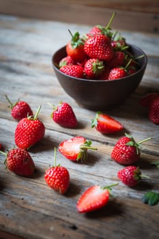 strawberry fruit on grunge wooden background